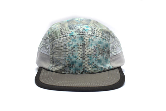 Cap with floral pattern on a white background