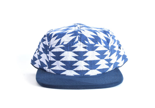 Blue and white patterned cap on a white background