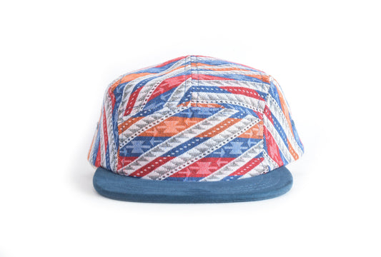 Colorful striped cap on a white background