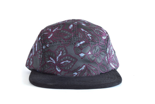 Floral-patterned cap on a white background