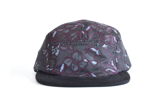 Floral-patterned cap on a white background